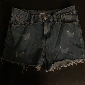 Old navy, blue shorts with butterfly pattern.